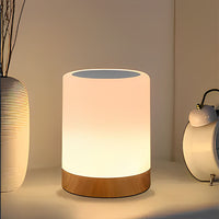 Lampe de chevet sans fil qui projette un éclairage blanc chaud 