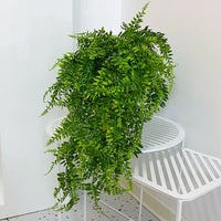 Fausse Plante Extérieur de Style Feuilles de Vigne sur fond blanc avec une table blanche