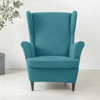 Housse Fauteuil Bleue en Polyester avec Grains de Maïs sur fond gris avec une plante à gauche