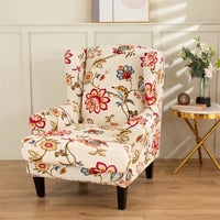 Housse de Fauteuil à Imprimé Floral en Polyester sur fond blanc et sol beige avec une table et des fleurs à droite