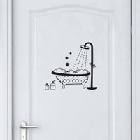 Sticker Mural Salle de Bain Style Baignoire qui Mousse avec des Bulles collé sur une porte blanche