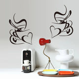 Sticker Mural Salon avec Deux Tasses à Café et Deux Cœurs collé sur un mur blanc avec une cafetière une lampe et un plateau avec des assiettes